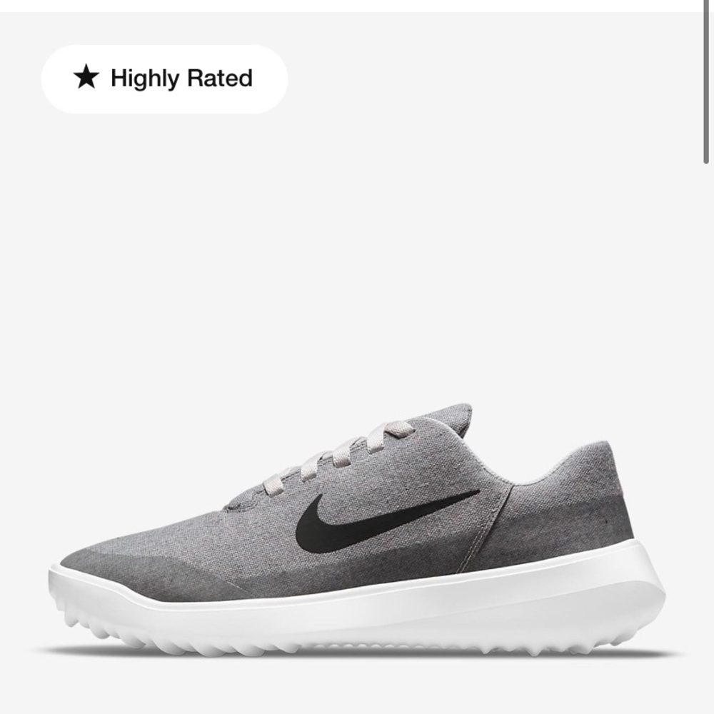 Gray Nike Spike-less golf shoes. NTW
